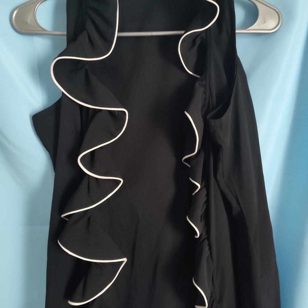 Elegant Black Cape with White Trim